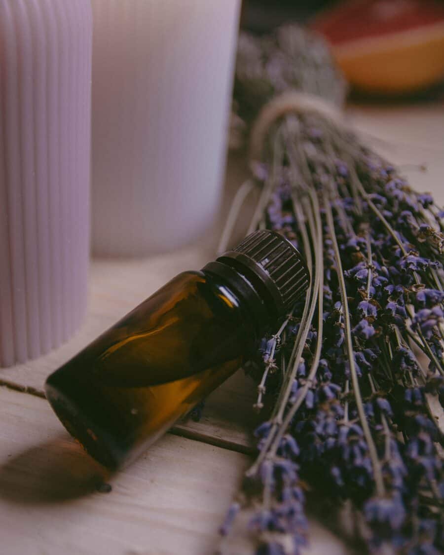 Dried lavender beside an amber oil bottle